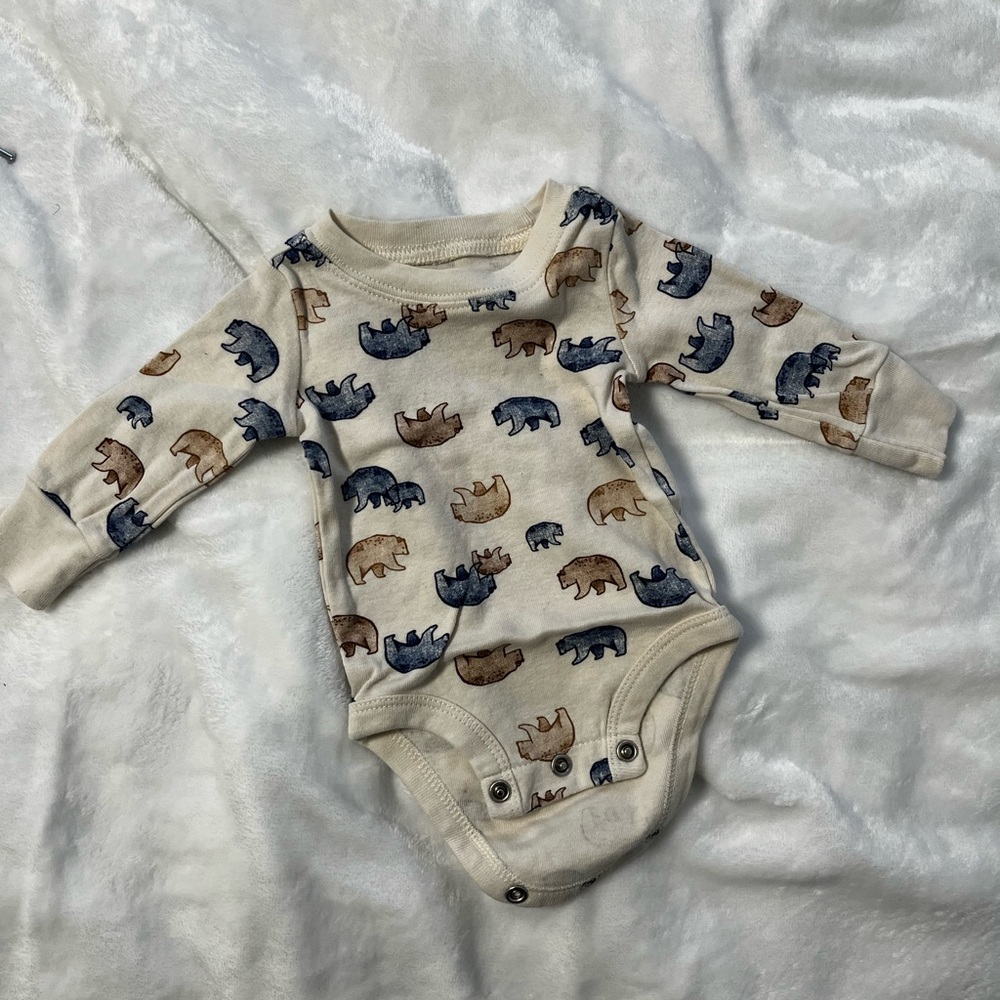 Beige onesie, brand new carters